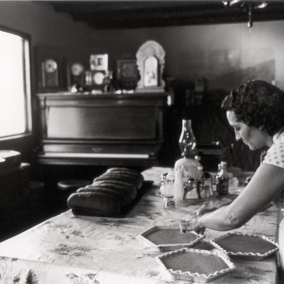 Woman Baking Pies, Lone Pine Inn, Colorado by Myron Wood