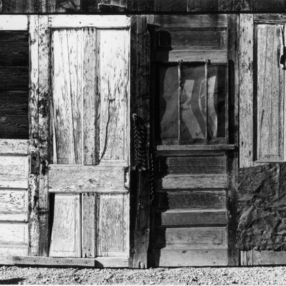 Old Doors, Walsenburg, Colorado by Myron Wood